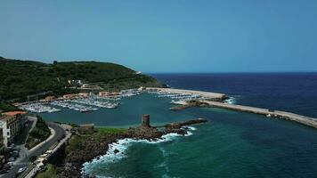 Aerial view of Torre di Frigiano in Castelsardo port in Sardinia video