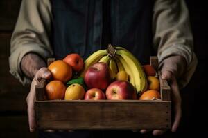 The farmer is holding a wooden box full of fresh fruits. Fruit basket apples, bananas, oranges. ai generative photo