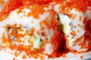 Enjoying delicious california roll photo