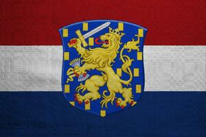 Flag and coat of arms of Caribbean Netherlands on a textured background. Concept collage. photo