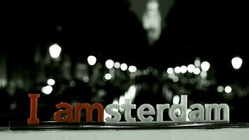 I am-sterdam - bw and red letters photo