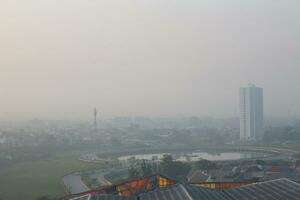 The view of the sunrise in the middle of the city seen from above, photo