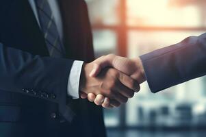 Successful business agreement handshaking between two people photo