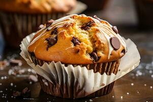 Freshly baked chocolate chip muffin photo