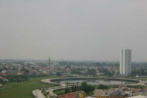 View of tall buildings, seen from the rooftop. photo