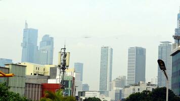 View of buildings covered in fog photo