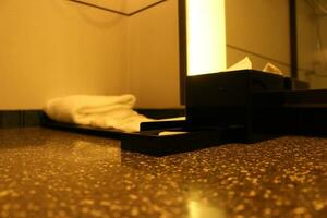 Elegant bathroom with towels and mirror photo