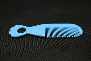 Blue baby hair comb tool photo