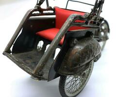 Old rickshaw figure, home decoration. photo