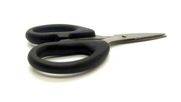 black scissors with white background photo