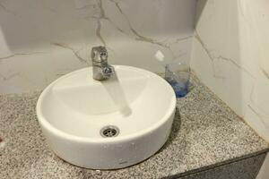 Sink in toilet. photo