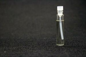 Close up small perfume bottle photo