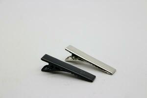Two hairpins on white background photo