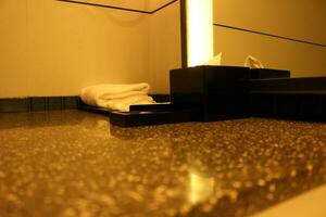 Elegant bathroom with towels and mirror photo