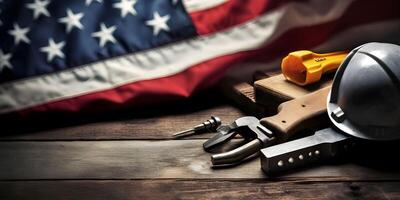Construction tools with American flag on dark black background. Labor day banner. photo