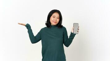 Holding Smartphone and Showing blank screen and holding on palm other hand Of Beautiful Asian Woman Isolated On White Background photo