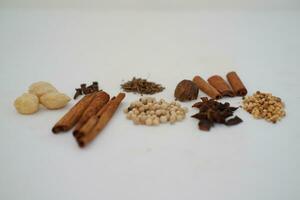 spices and herbs on a white background photo