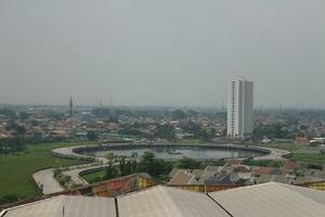 View of tall buildings, seen from the rooftop. photo