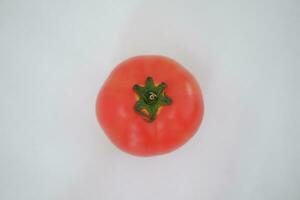 tomato on a white background, close-up, isolated. photo