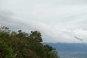 Landscape view of the mountain and cloudy sky with copy space photo