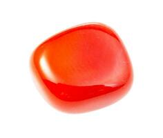 polished Cornelian gemstone isolated on white photo