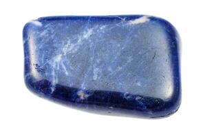 tumbled Sodalite gem isolated on white photo