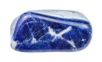 tumbled Sodalite gem stone isolated on white photo