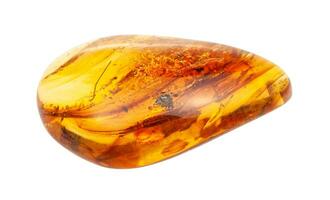 polished Amber gem stone with inclusions isolated photo