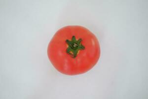 tomato on a white background, close-up, isolated. photo