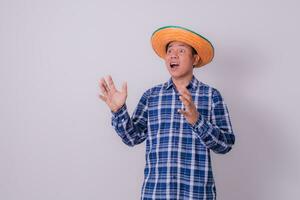 Asian farmer wearing striped shirt photo