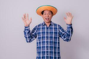 Asian farmer wearing striped shirt photo