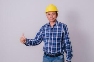 Asian engineer in striped shirt on white background photo