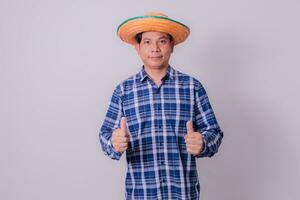 Asian farmer wearing striped shirt photo