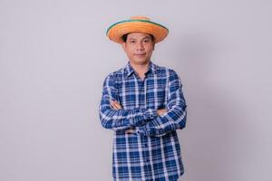 Asian farmer wearing striped shirt photo