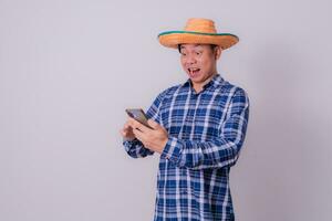 Asian farmer wearing striped shirt photo