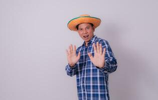 Asian farmer wearing striped shirt photo