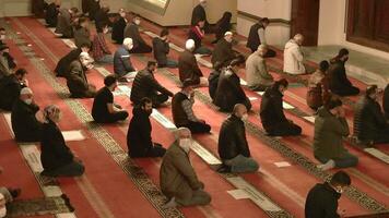 Bursa, Turkey, 2023 - Crowd of Muslim people praying in Bursa Grand Ulu Mosque. video