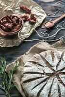 Rye bread with sun-dried tomatoes photo