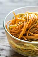 Bowl of colorful spaghetti photo