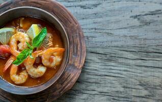 Spicy french soup with seafood photo