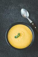 Bowl of lentil coconut creamy soup photo