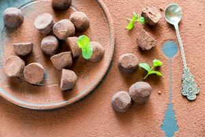 Chocolate truffles flat lay photo