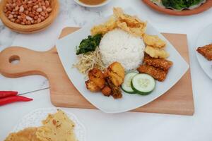 Thai food with rice, fried tofu, shrimp paste, sweet and sour sauce photo