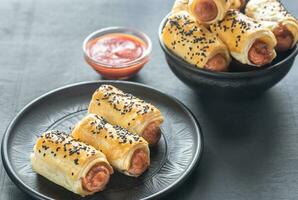 Sausage rolls closeup photo