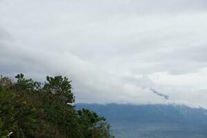 Landscape view of the mountain and cloudy sky with copy space photo