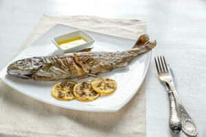 Grilled trout with lemon photo