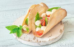 Caprese tacos closeup photo