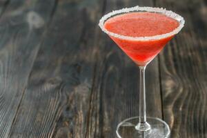 Glass of strawberry margarita cocktail photo