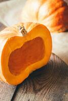 Pumpkin on the wooden background photo