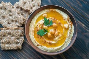 Bowl of hummus photo